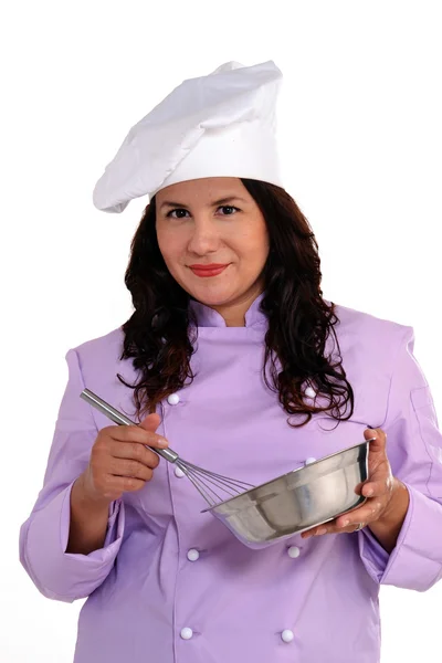Glückliche Köchin Porträt mit Kochmütze. — Stockfoto