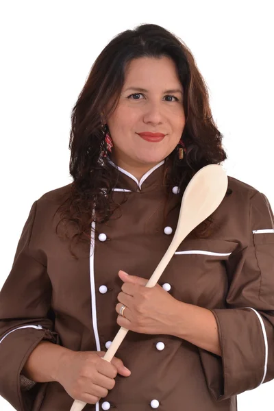 Happy woman chef holding a wood spoon. — Stock Photo, Image