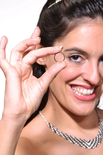 Happy bride holding an engagement ring — Stock Photo, Image