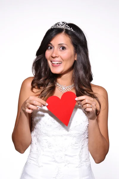 Happy bride holding a paper heart — Stock Photo, Image