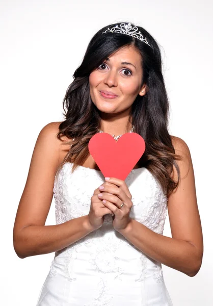 Happy bride holding a paper heart — Stock Photo, Image