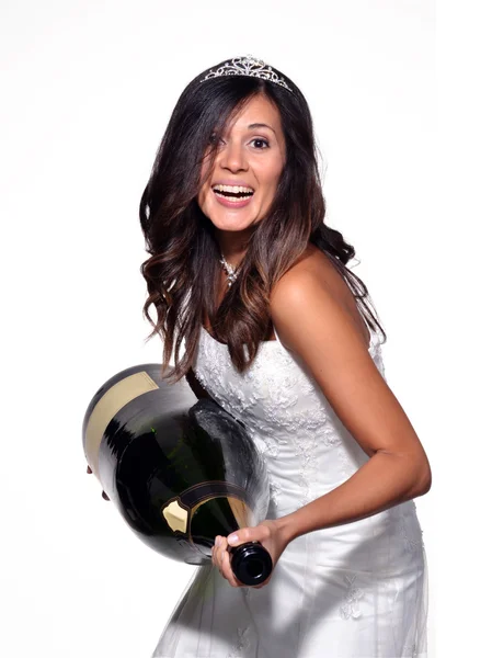 Happy bride holding a big champagne bottle — Stock Photo, Image