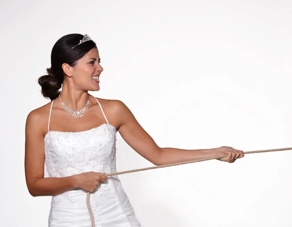 Anger bride pulling a rope — Stock Photo, Image