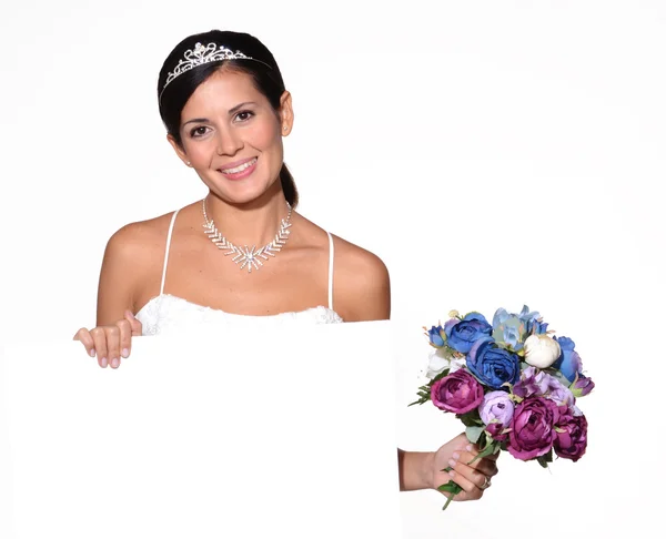 Happy bride holding a white panel — Stock Photo, Image