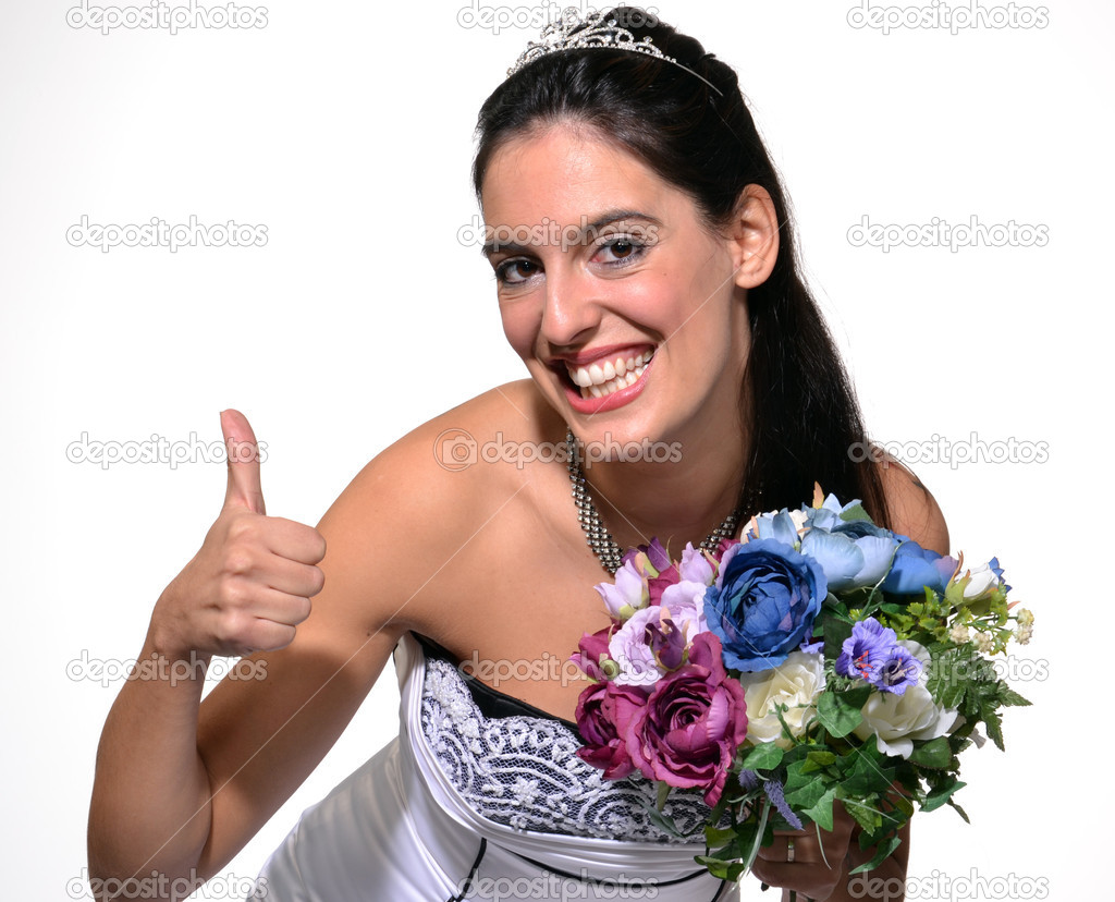Happy bride holding a bouquet