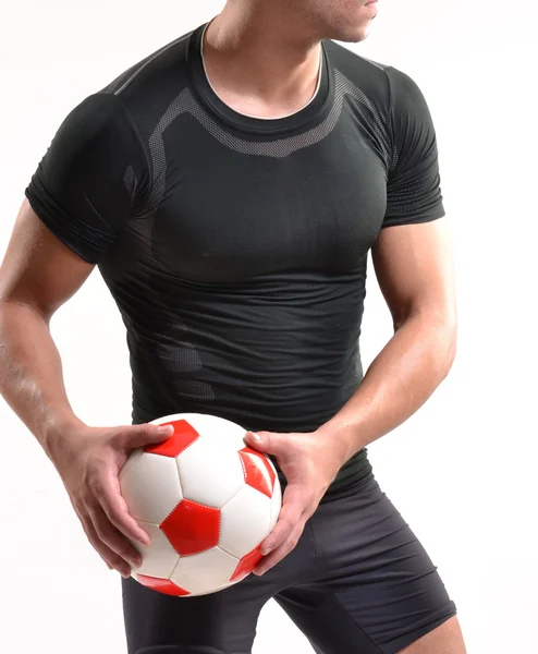 Fitness soccer player and a soccer ball. — Stock Photo, Image