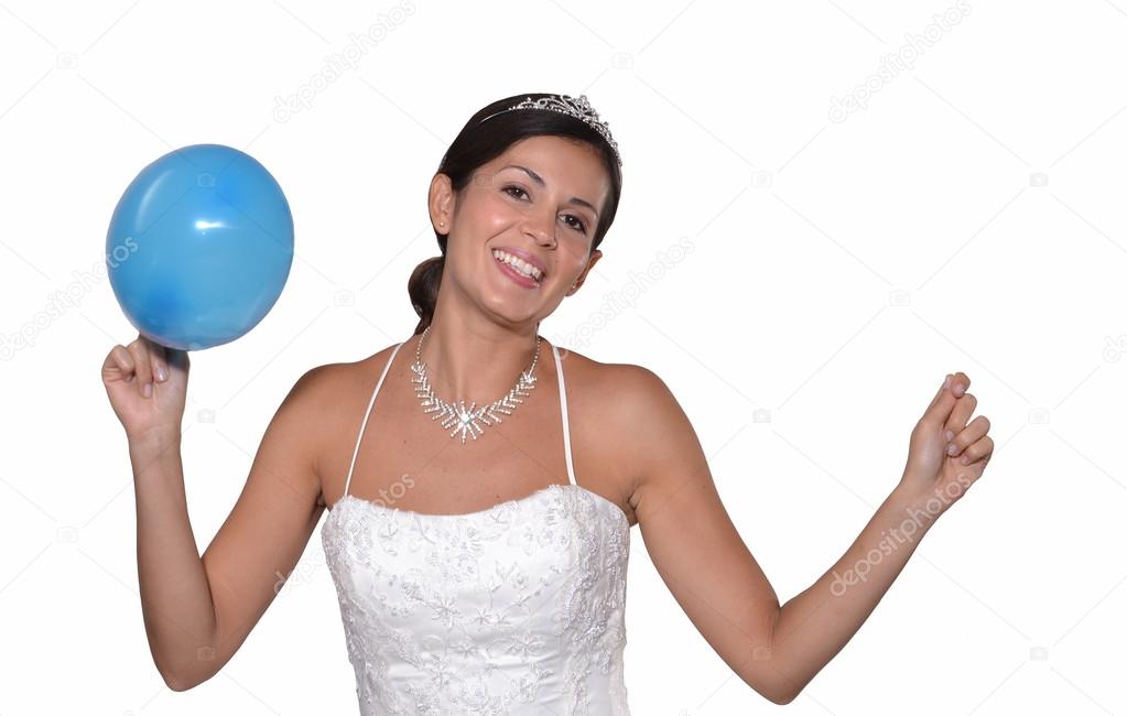 Happy bride holding a party balloons