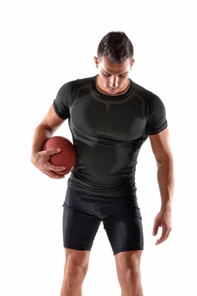 Man holding a rugby ball — Stock Photo, Image