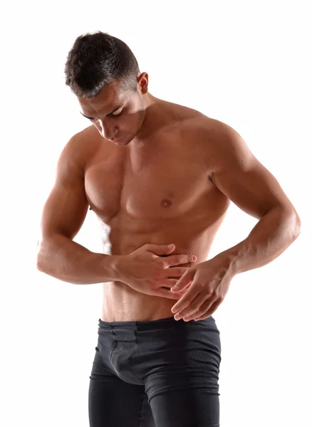 Hombre de fitness tocando sus músculos abdominales —  Fotos de Stock