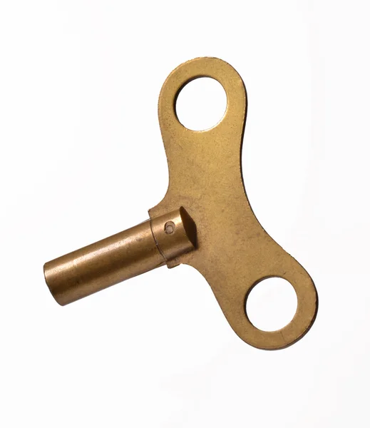 Metalen oude klok sleutel — Stockfoto