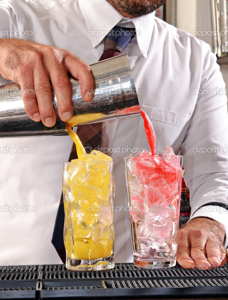 Bartender preparing cocktail drinks.