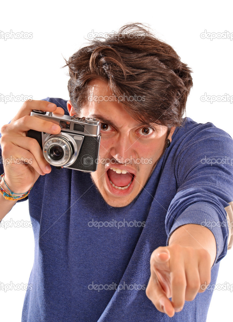 Angry Photographer holding  camera.