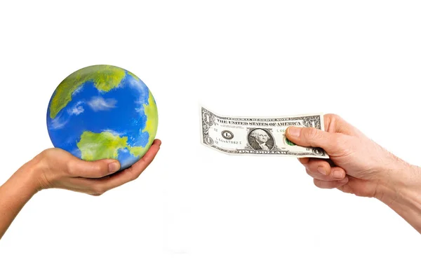 Mão Segurar Planeta Terra Globo Recebendo Uma Nota Dólar — Fotografia de Stock