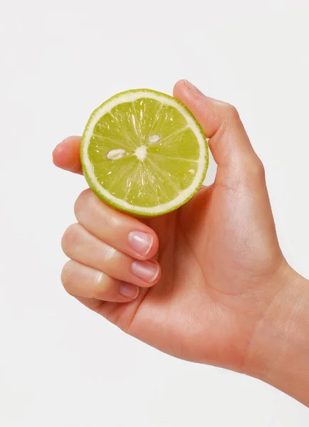 Female Hand Holding Half Fresh Lemon White Background — Stock Photo, Image