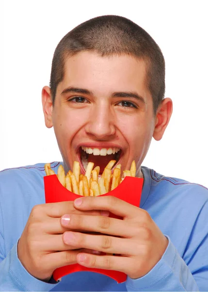 Engraçado Garoto Mordendo Frensh Batata Batatas Fritas Saco Retrato Fundo — Fotografia de Stock