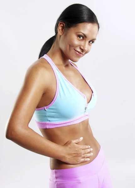 Latin Woman Touching Her Belly Training Workout — Stockfoto