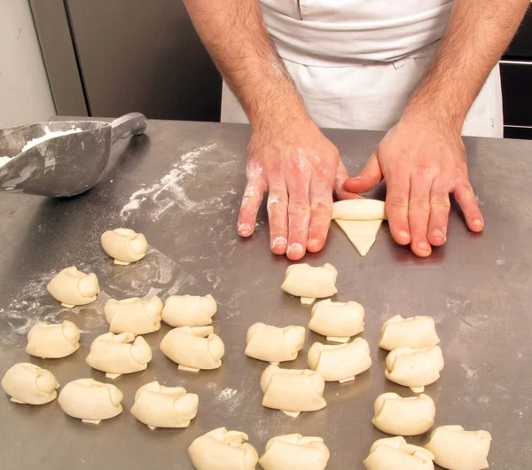 Pastry chef preparing and making peach marmelade mini briosh