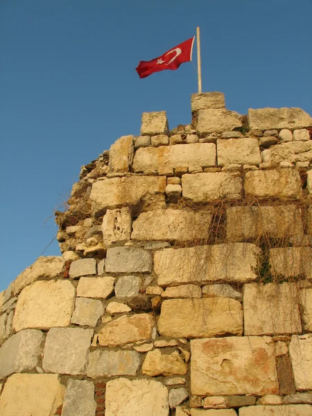 Flag on ancient fortress — Stock Photo, Image