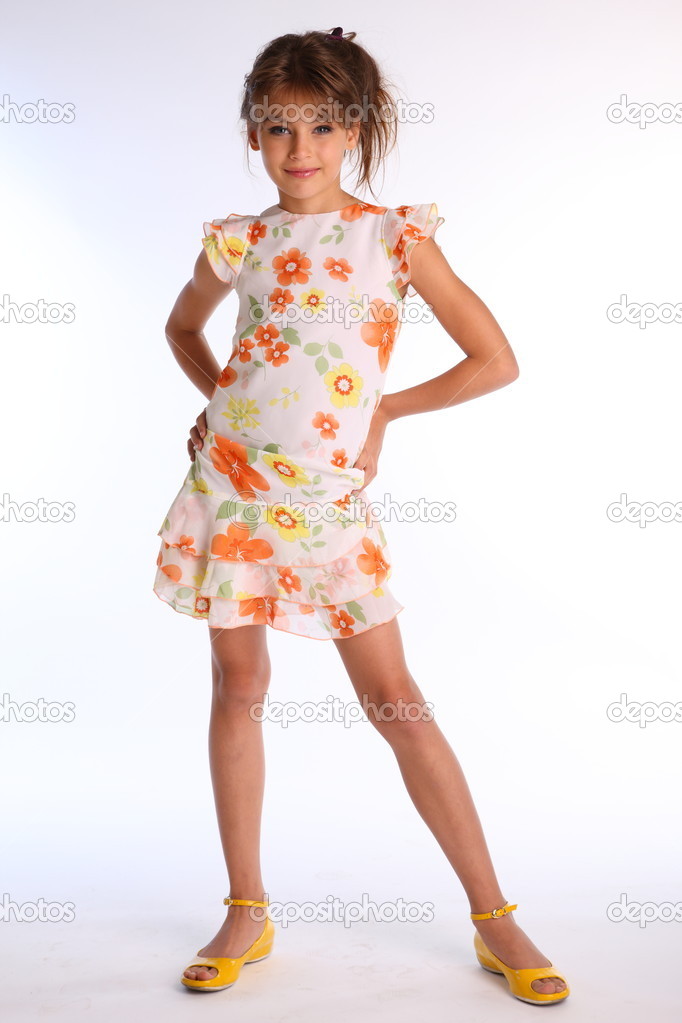 Small girl posing in colourful dress — Stock Photo © AntonioClemens ...