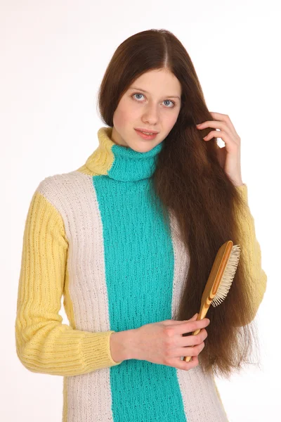 Vacker ung flicka med magnifika hår年轻漂亮的女孩，与华丽的头发. — Stockfoto