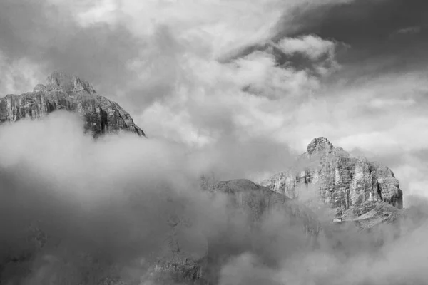 dramatic sky on mountain peaks of italian alps