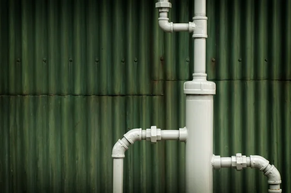 Water werkt pijpen voor grunge achtergrond — Stockfoto