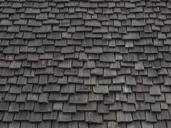 Versleten houten dakspanen Stockfoto