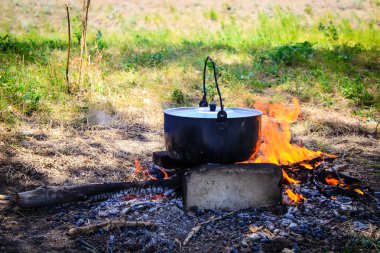 çaydanlığı ateşe
