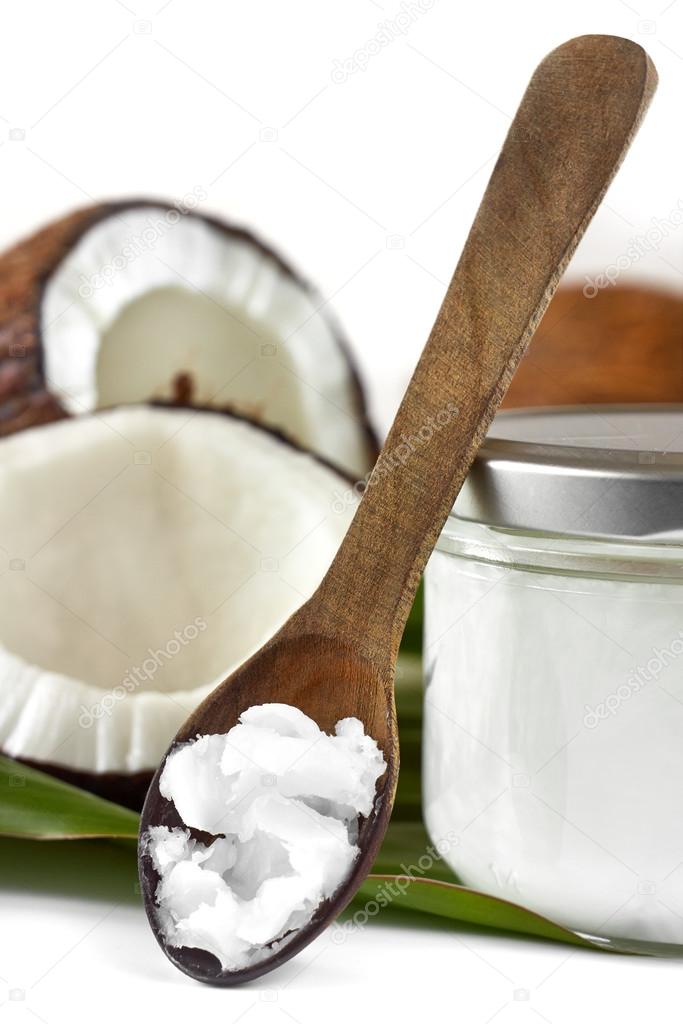 Close-up of coconut oil on the wooden spoon