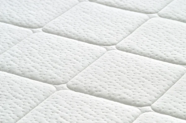 Close-up of white mattress texture. — Stock Photo, Image