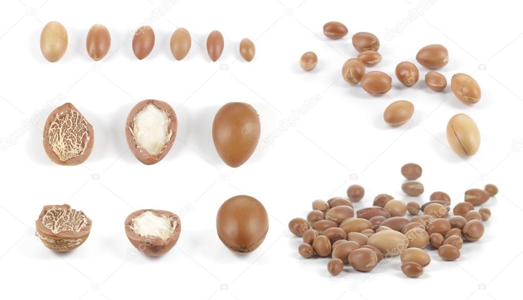 Set of groups of argan nuts on white background.