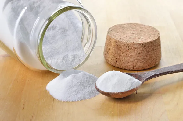 Close-up of baking soda in a glass jar. — Stock Photo, Image