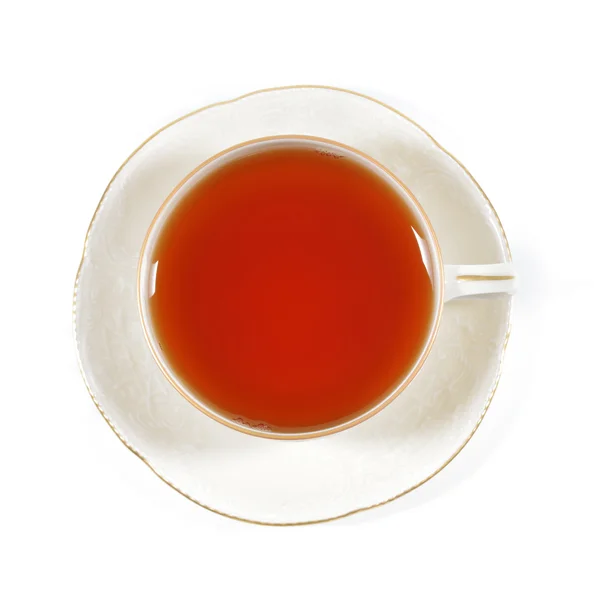 Black tea in a porcelain cup. — Stock Photo, Image