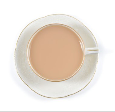 siyah bir porselen fincan sütlü çay.