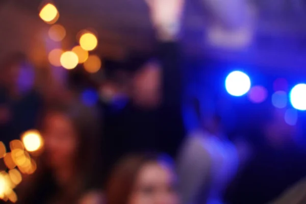 Blured background night scene in party night club. Bokeh light. — Fotografia de Stock