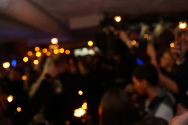 Blured background night scene in party night club. Bokeh light. — Fotografia de Stock