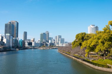 Osaka, Japan - Jan 03 2022- Okawa River (Kyu-Yodo River) view from Tenma Bridge (Tenmabashi) in Chuo-ku, Osaka, Japan.