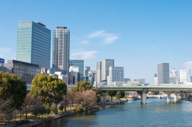 Osaka, Japan - Jan 03 2022- Okawa River (Kyu-Yodo River) view from Tenjin Bridge (Tenjinbashi) in Nakanoshima, Kita-ku, Osaka, Japan.