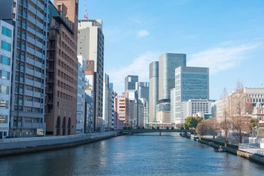 Osaka, Japan - Jan 03 2022- Tosabori River (Kyu-Yodo River) view from Nanba Bridge (Nanbabashi) in Kitahama, Chuo-ku, Osaka, Japan.