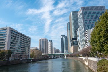 Osaka, Japan - Jan 03 2022- Tosabori River (Kyu-Yodo River) view from Yodoya Bridge (Yodoyabashi) in Nakanoshima, Kita-ku, Osaka, Japan.