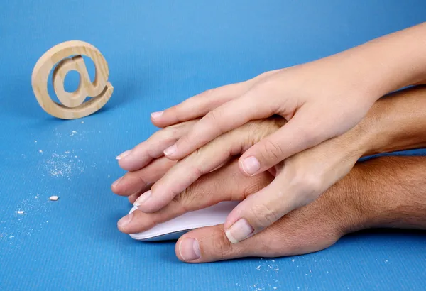 PC mouse with three hands with cookies traces and sign at — Stock Photo, Image