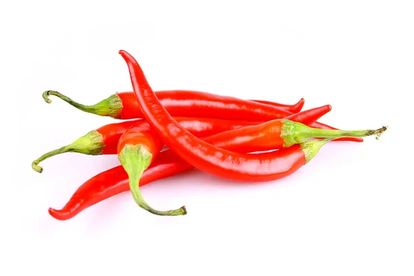 Pięć red hot chili pieprz na białym tle — Zdjęcie stockowe