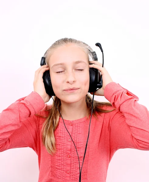 Szőke lány Fejhallgatója zenehallgatásra és várom — Stock Fotó