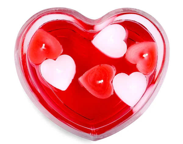 Corazón de cristal con velas para el día de San Valentín — Foto de Stock