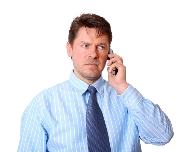 Empresario en camisa azul con teléfono en la mano — Foto de Stock