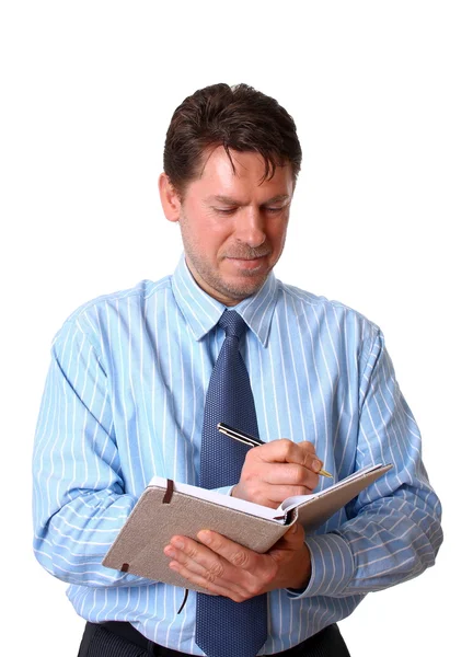 Happy Employee writes notes in notebook — Stock Photo, Image