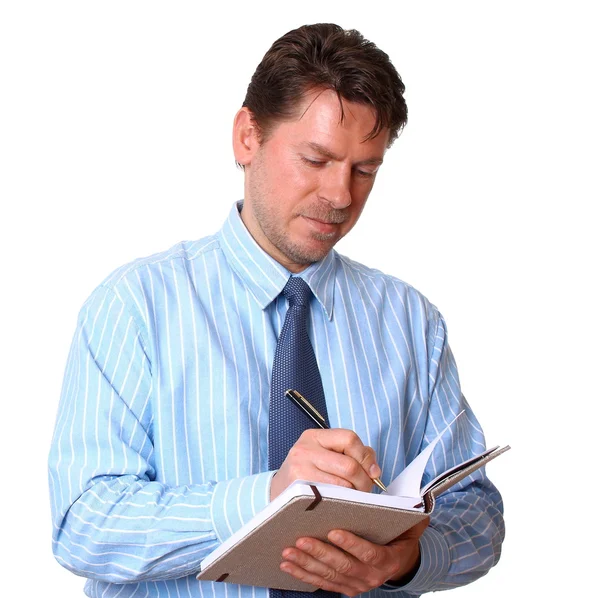 Satisfied Employee writes notes in notebook — Stock Photo, Image