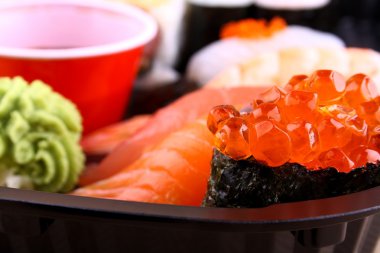 The focus of salmon caviar ikura sushi menu clipart