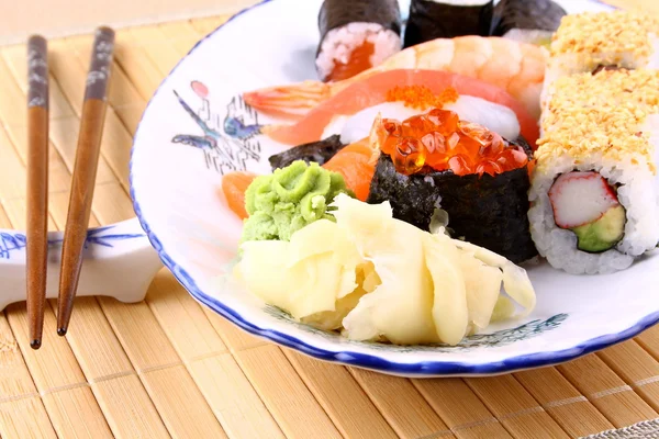 Various sushi, chopsticks and red caviar, close up — Stock Photo, Image