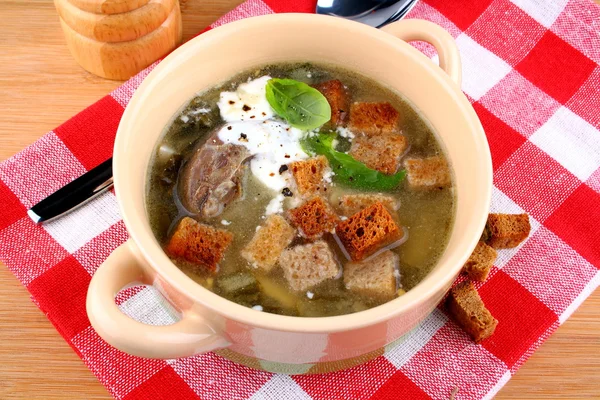 Green soup with egg, meat, cream and croutons — Stock Photo, Image